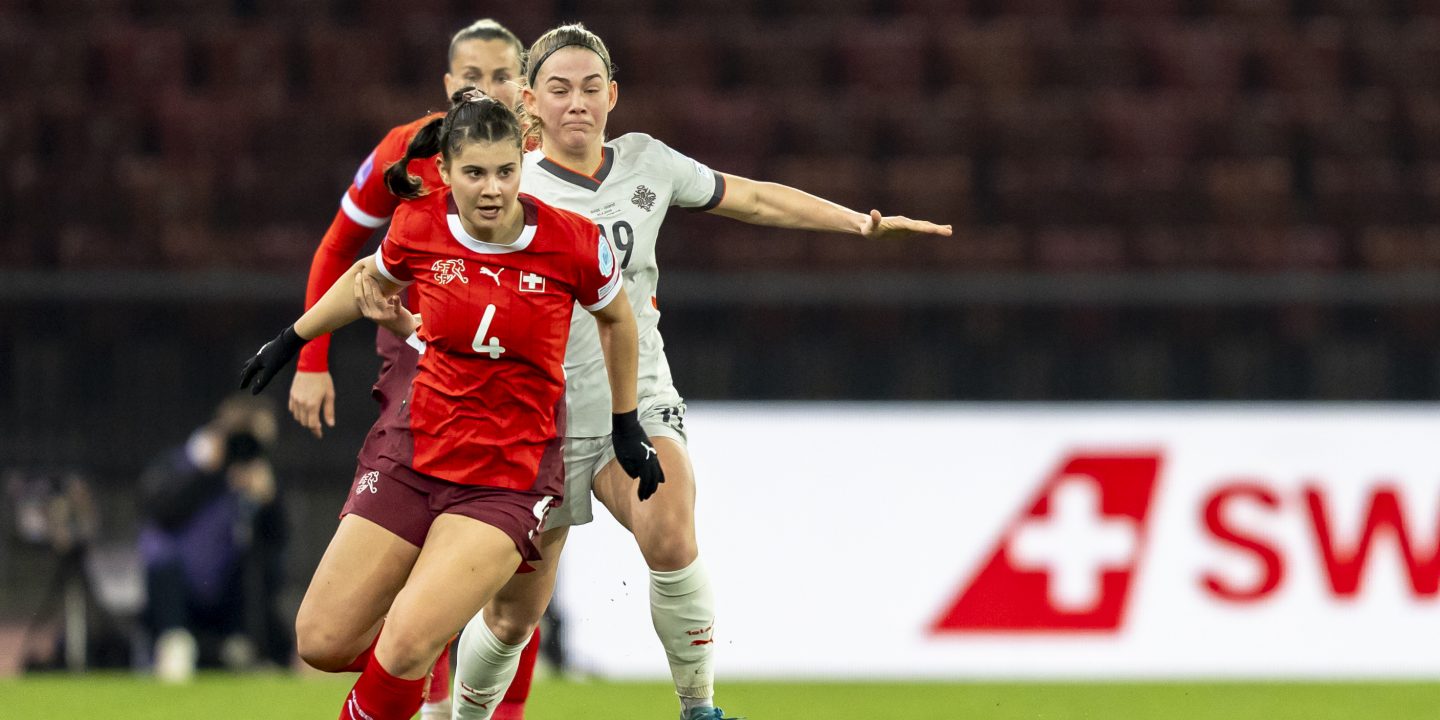 Switzerland's Noemi Ivelj , left, fights for the ball against Iceland's Saedis Heidarsdottir, right, during the UEFA Nations League women's soccer match between Switzerland and Iceland at Letzigrund stadium in Zurich, Switzerland, Friday, February 21, 2025. (KEYSTONE/Til Buergy)