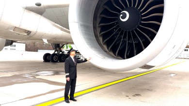 During the preflight check, Dominik inspects the GE90 engines, clearly impressed by the curved fan blades.