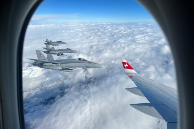 SWISS Airbus A220 and three F/A18