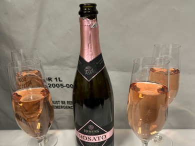 Non-alcoholic sparkling wine with glasses. 