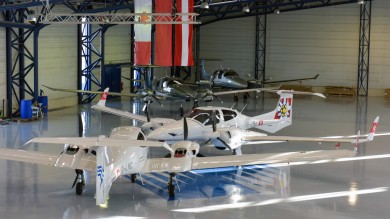 Two training aircrafts in the hangar. 