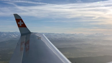 Austrian Alps can be seen while watching out of the window. 