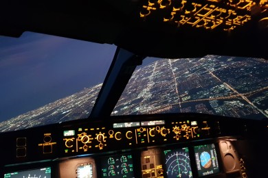 View out of the cockpit at night. 