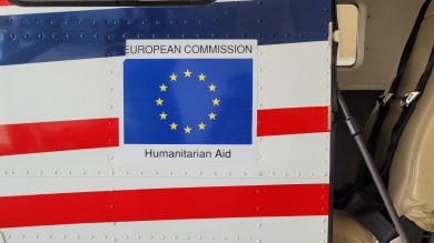 Sticker of the European Commission’s Humanitarian Aid displayed on an airplane.