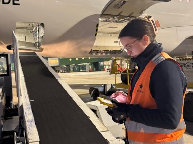 In Gothenburg, Loading Supervisor Louise Dahlström checks the baggage numbers before suitcases and bags are loaded onto the aircraft for the return flight.