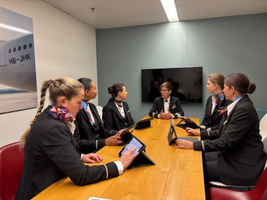 During the crew briefing, the team prepares for the flight.