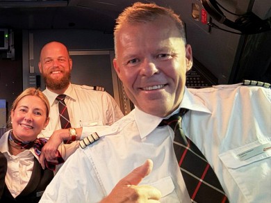 Captain Fredrik Lindegren, here with his crew, has been a pilot for over forty years. 