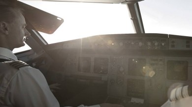 One of the pilots in the cockpit from Zurich to Nice