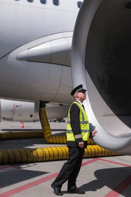 Flight captain next to aircraft