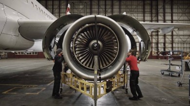 SWISS Technics working on an engine
