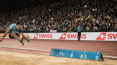 One athlete performing a wide jump