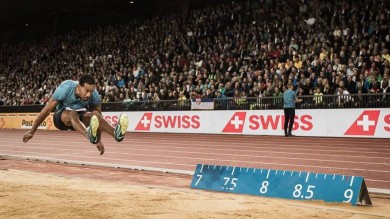 One athlete performing a wide jump