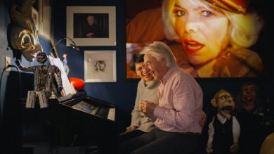 Mr and Mrs Steinberger sit together at the piano. 