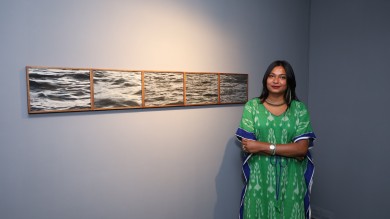 Ishita at her solo exhibition ‘Sleeping in the Bed of Salt’ at Galerie Espace, New Delhi, India, 2023. Image courtesy of Galerie Espace.