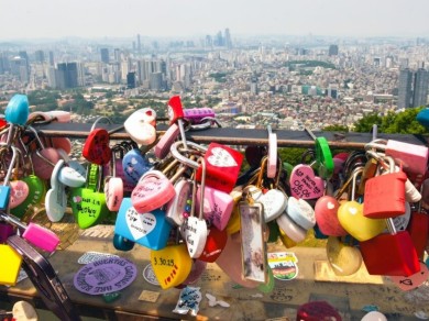Colorful love locks hang everywhere on the railing of the Namsan observation deck.