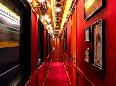 A glimpse inside the luxurious corridor of Le Grand Tour, where the opulence of the Belle Époque era meets modern comfort in every detail.