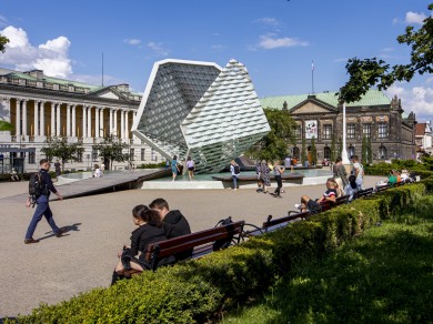  Plac Wolności combines classical architecture with modern urban life, with the Raczyński Library and its striking glass installation at the centre.