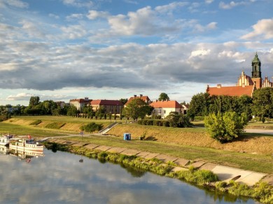 Cathedral Island, with Poznań Cathedral rising above the Warta River, is regarded as the cradle of the Polish state and offers a moment of calm within the city.